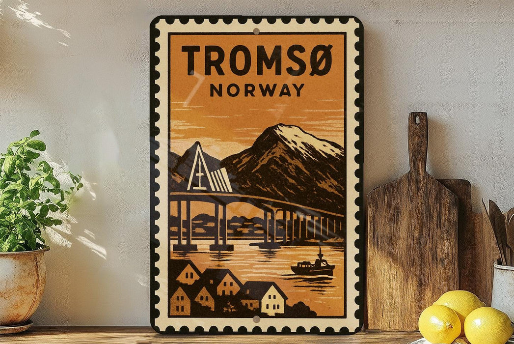 A vintage-style metal sign with a mountain landscape and a bridge, featuring the text "TROMSO NORWAY" in the center.