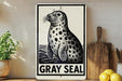 A sign featuring a black and white illustration of a gray seal, with the text "GRY SEAL" below it.