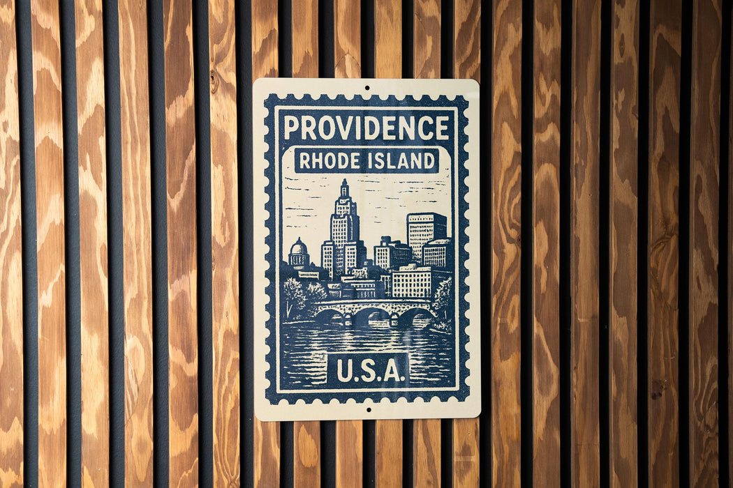 A metal sign with a cityscape and text, mounted on a wooden wall.