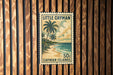 A vintage postage stamp from the Cayman Islands, featuring a tropical beach scene with palm trees and a cloudy sky.