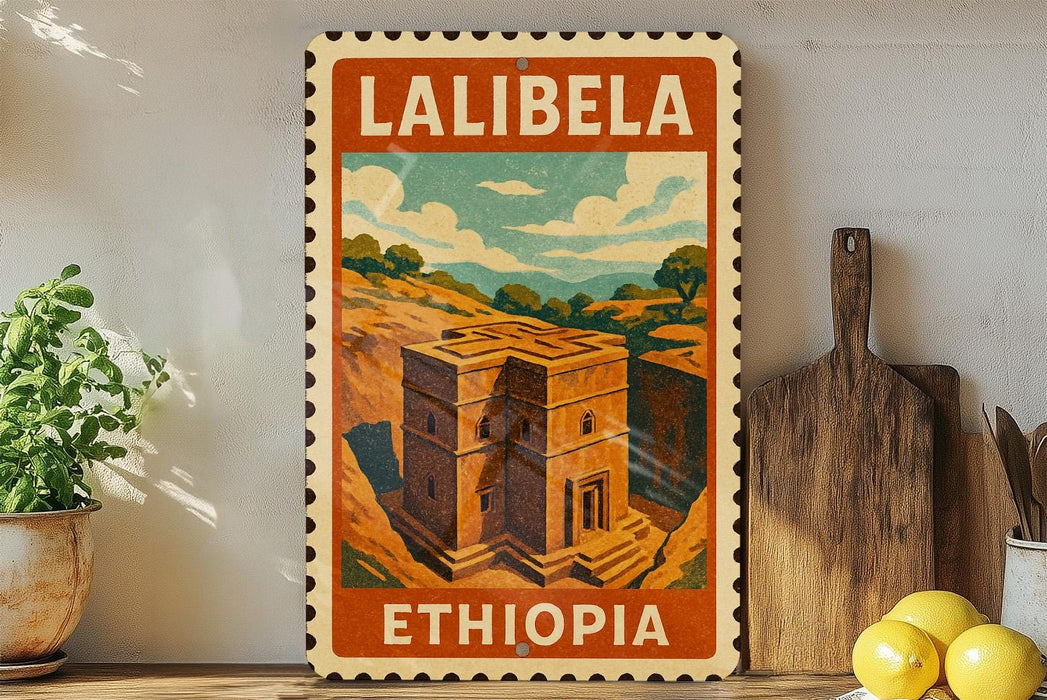 A vintage-style metal sign with the text "LALIBEA" and "ETHIOPIA" printed on it, depicting a building in Ethiopia. The sign is displayed on a shelf next to a potted plant, a wooden cutting board, and some lemons.