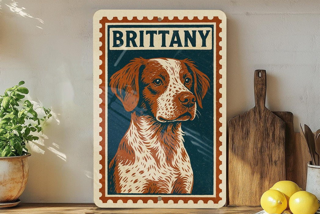 A framed illustration of a dog, specifically a brittany dog, is displayed on a shelf next to a wooden cutting board and some lemons.