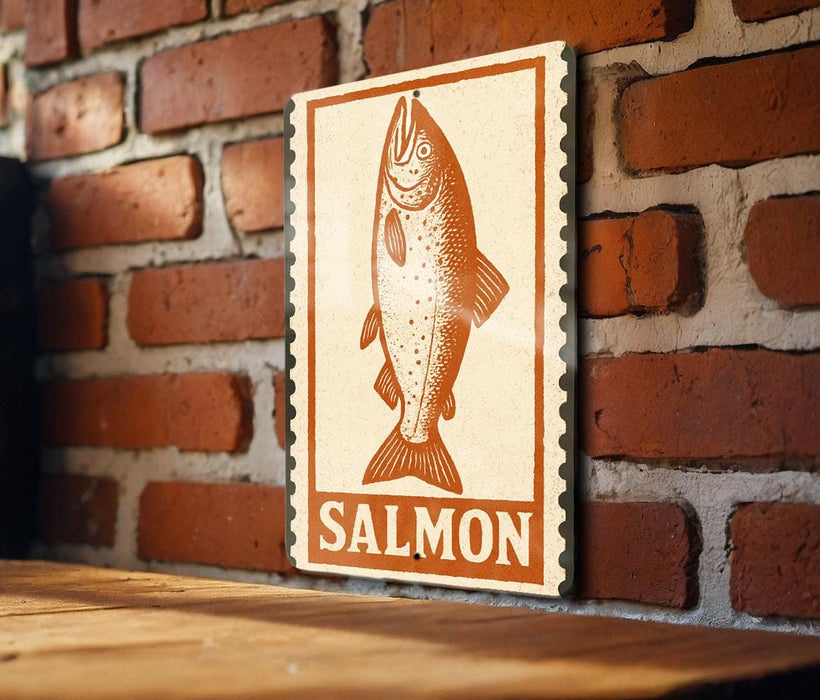 a wooden table with a framed sign featuring a fish, specifically a salmon, on it.