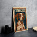 A metal sign featuring a portrait of a dog with the name "BRITTANY" on it, placed on a countertop next to some black camera lenses.