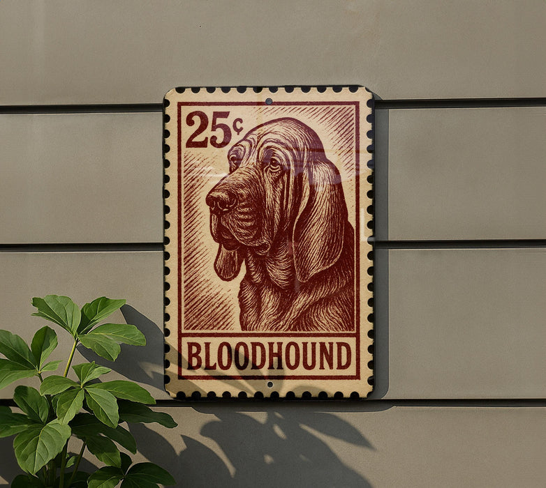 a 25¢ postage stamp with a bloodhound illustration, mounted on a wall next to a plant.