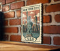 A vintage-style postage stamp featuring the Statue of Liberty in New York City, with the text "NEW YORK CITY USA" prominently displayed.