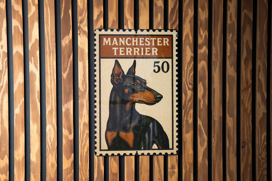 A Manchester Terrier dog is depicted on a postage stamp-like sign, which is mounted on a wooden wall.