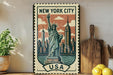 A vintage-style metal sign featuring the Statue of Liberty and New York City skyline, with the text "NEW YORK CITY USA" prominently displayed.