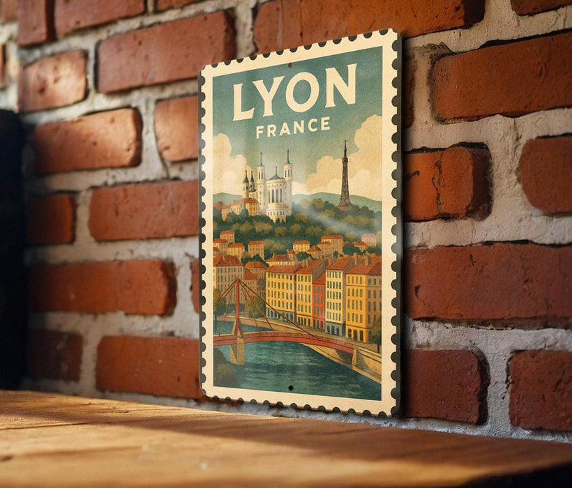 A vintage-style postage stamp depicting the city of Lyon, France, with a bridge and buildings in the background.