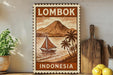 a vintage-style sign with a tropical island scene, including a sailboat, palm trees, and a mountain, along with the text "LOMBOK INDONESIA".