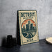 A metal sign with a cityscape and text, likely representing Detroit, Michigan, USA.
