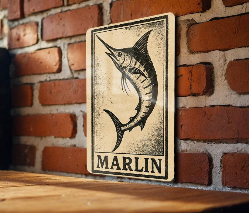 A sign featuring a stylized illustration of a marlin fish is displayed on a brick wall.