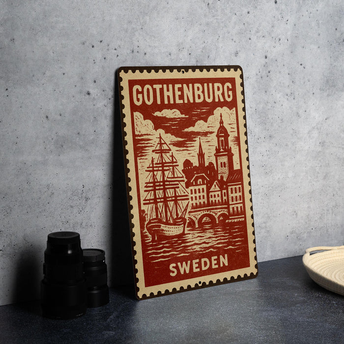 A vintage postage stamp featuring a ship and a cityscape, with the text "GOThenburg, Sweden" printed on it.