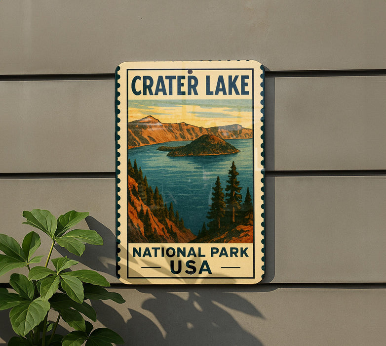 A vintage-style sign for Crater Lake National Park, featuring a scenic illustration of the lake and surrounding mountains.