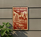 A vintage-style metal sign with a red and white color scheme, depicting a sailing ship and a cityscape, mounted on a gray wall.