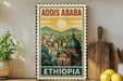 a vintage-style poster of Addis Ababa, Ethiopia, with a cityscape and a church in the background. The poster is displayed on a wall, and there are some kitchen utensils, such as a cutting board and a knife, visible in the foreground.