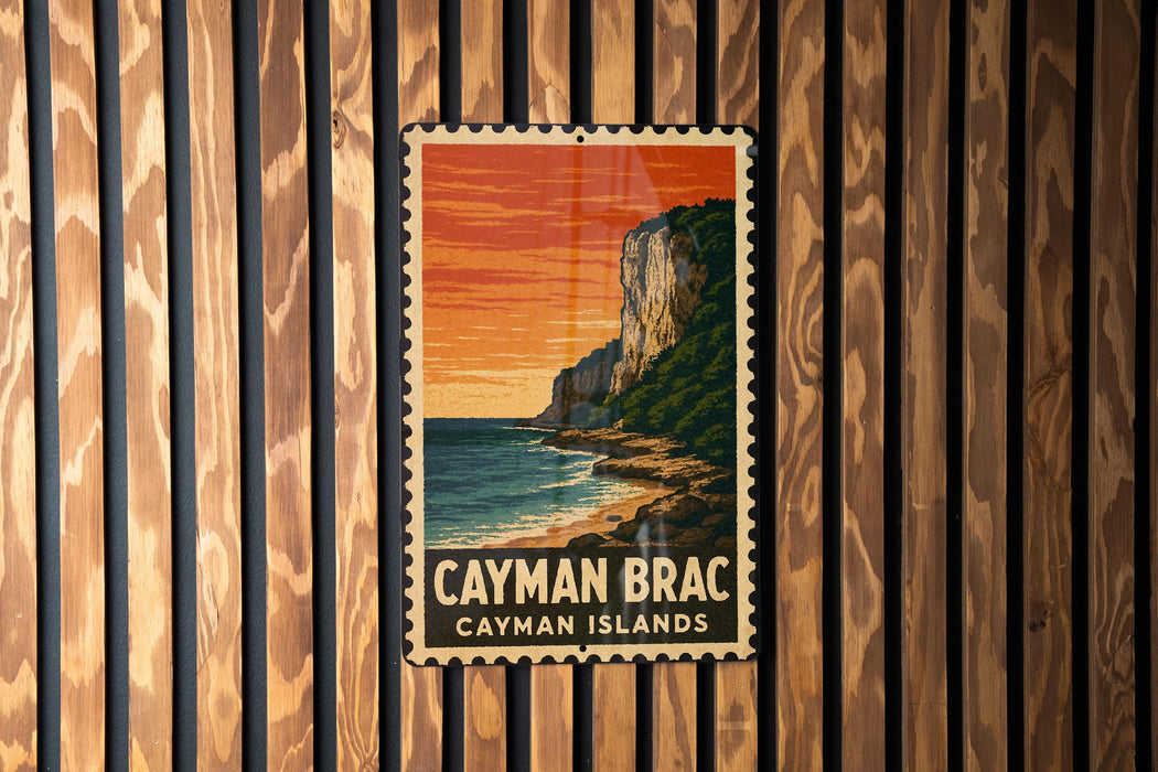 A vintage postage stamp depicting a scenic view of the Caribbean island of Cayman Brac, with a cliff overlooking the ocean.