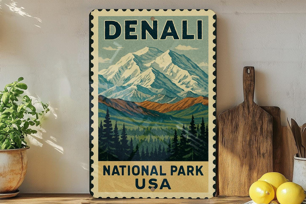 A vintage-style metal sign with a mountain landscape and pine trees, advertising the National Park in the United States.