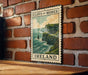 A vintage-style metal sign with the text "CLIFFS OF MOHER" and "IRELAND" printed on it, mounted on a brick wall.