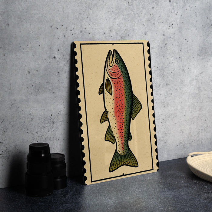 a framed illustration of a fish, specifically a rainbow trout, on a wall.