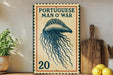 a vintage-style sign with a blue and white illustration of a jellyfish, placed on a wooden surface next to a wooden cutting board and some lemons.