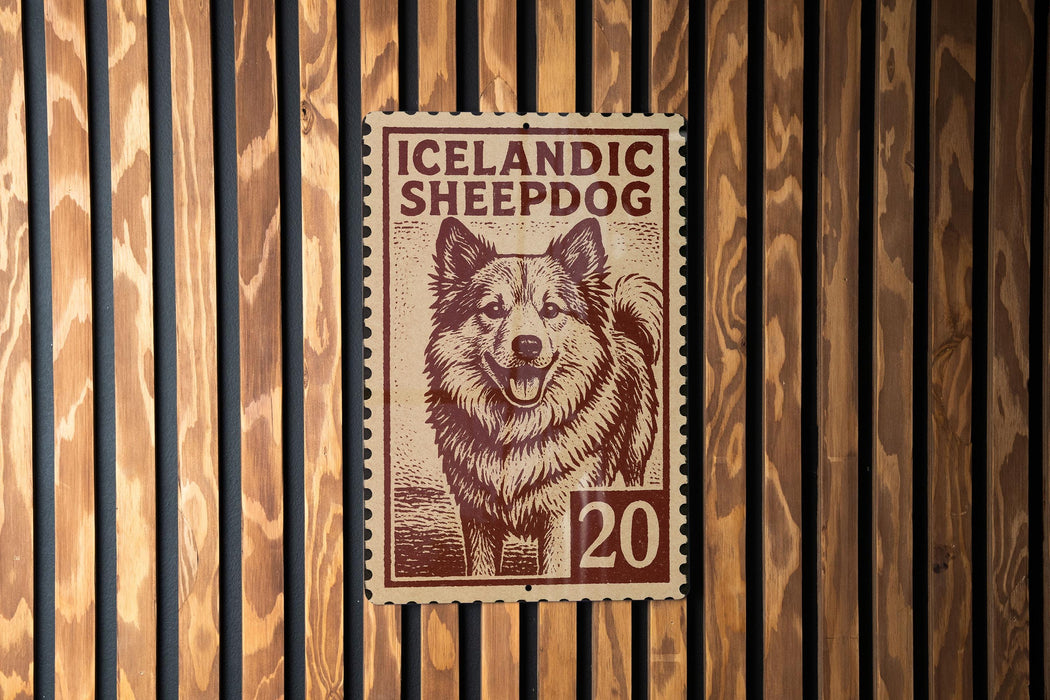 A brown and white sheepdog is depicted on a brown and white postage stamp, which is affixed to a wooden wall.