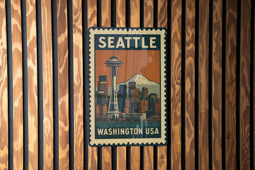 A vintage-style metal stamp depicting the Seattle skyline, with the text "SEATTLE WASHINGTON USA" prominently displayed.