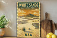 A vintage-style poster of White Sands National Park in the USA, featuring a desert landscape with mountains and a cloudy sky.