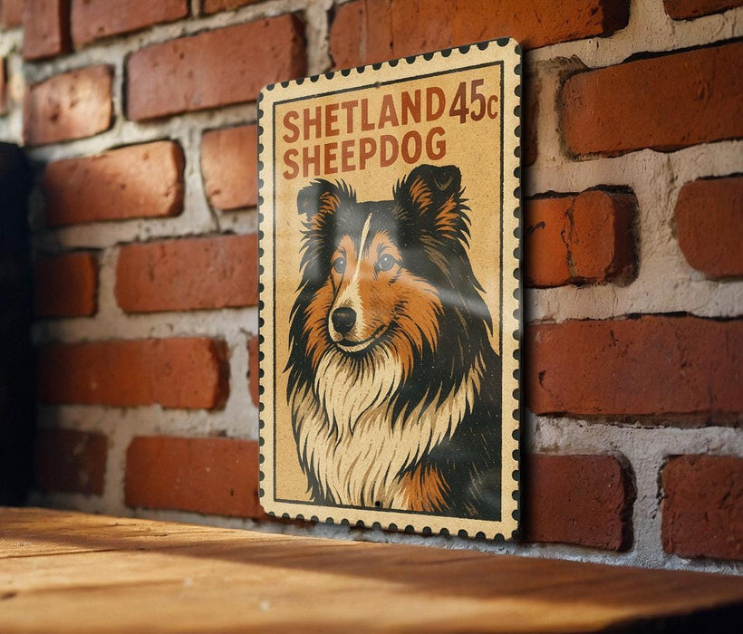 A framed image of a Shetland Sheepdog is displayed on a brick wall.