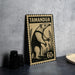 A metal stamp with a picture of a Tamandua (tamandua) and the text "TAMANDUA" printed on it, along with the denomination "60c". The stamp is placed on a table next to some black camera lenses.