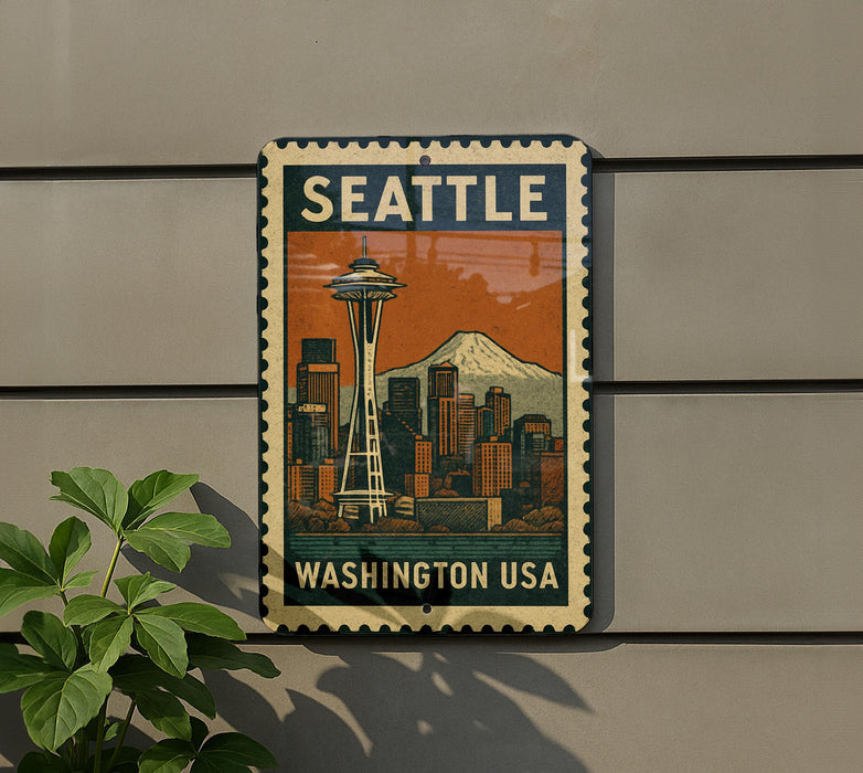 A vintage-style metal sign with the word "SEATTLE" and an illustration of the Space Needle, mounted on a wall.