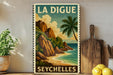 A vintage-style poster of the Seychelles, featuring a tropical beach scene with palm trees and rocky cliffs, is displayed on a wall next to a wooden cutting board and a potted plant.