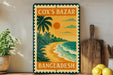 a vintage-style sign for Cox's Bazar, Bangladesh, with a tropical beach scene and palm trees depicted on the sign.
