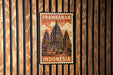 A vintage Indonesian postage stamp featuring the Prambanan temple, which is a significant landmark in Indonesia.
