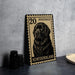 A metal stamp featuring a black dog, likely a Labrador, with the text "20 POSTAGE NEWFOUNDLAND" printed on it.