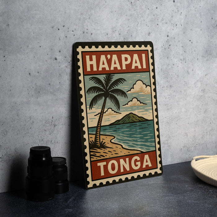A vintage-style metal sign with a tropical beach scene and palm tree, featuring the text "HA'APAI TONGA" in the center.
