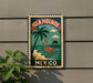 A vintage-style metal sign with a flamingo and palm tree, depicting a tropical beach scene, is mounted on a wall.