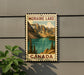 A vintage-style metal sign displaying the name "MORaine Lake" and the word "CANADA" is mounted on a wall.
