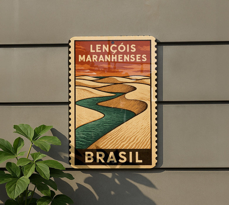 A sign for the Lençois Maranhenses, a landmark in Brazil, featuring a desert landscape with a winding river.