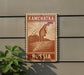 a sign that reads "KAMCHATKA RUSSIA" with a map of Russia and a mountain range.