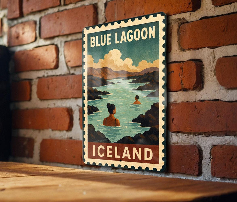 A vintage-style poster of Blue Lagoon, a famous hot spring in Iceland, is displayed on a brick wall.
