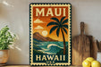 A vintage-style metal sign with the text "MAUI HAWAII USA" and a tropical landscape depicting a palm tree, mountains, and a sunset.