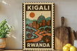 A vintage-style poster of Kigali, Rwanda, featuring a cityscape with a sun and mountains in the background.