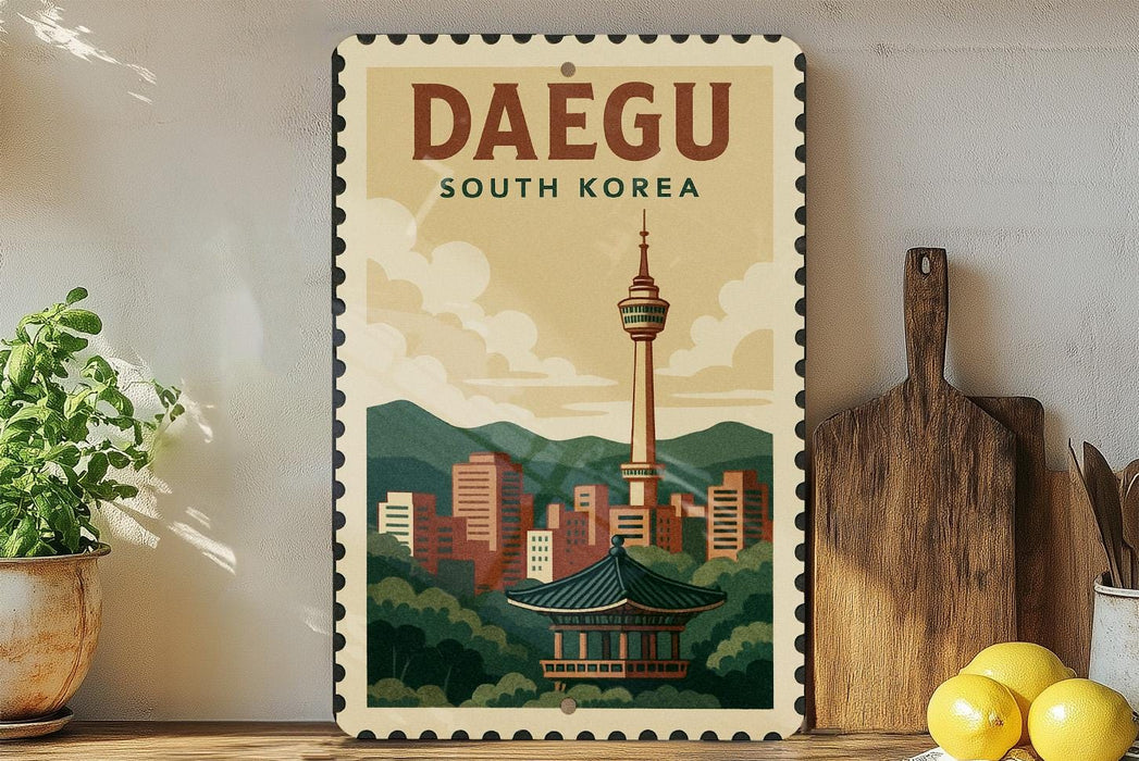 A vintage-style poster of the Daegu Tower, a famous landmark in South Korea, displayed on a wall next to a wooden cutting board and some potted plants.