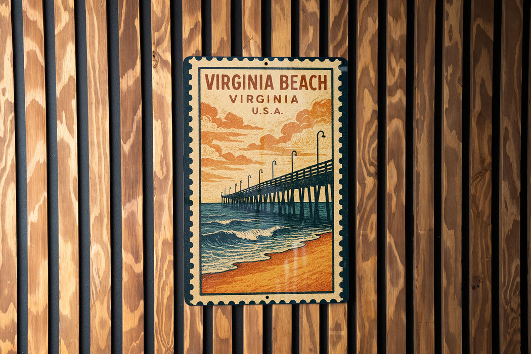 A vintage-style poster of the Virginia Beach pier is displayed on a wooden wall.