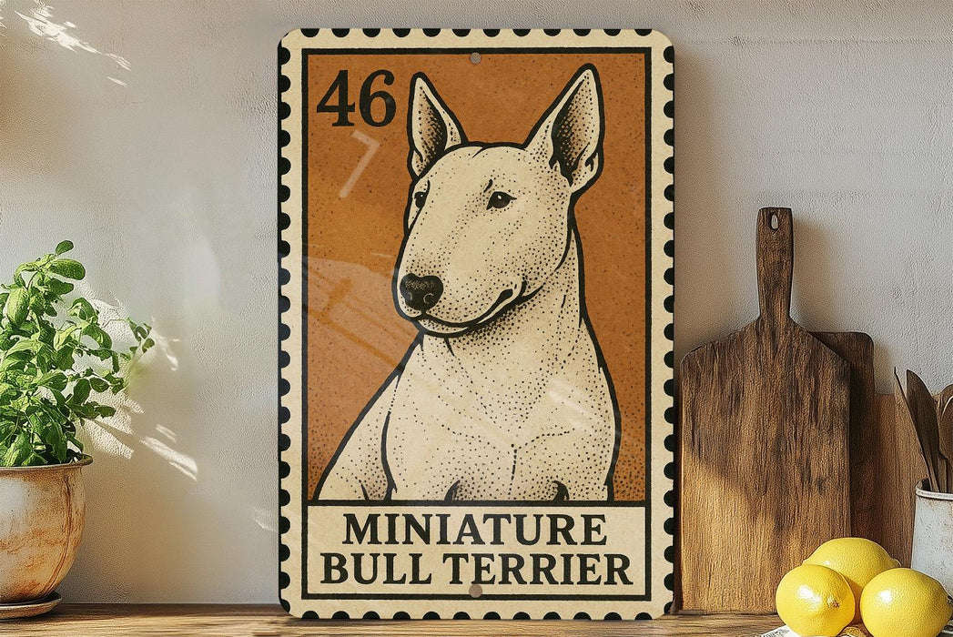 a miniature bull terrier, a small dog breed, displayed on a wooden surface.