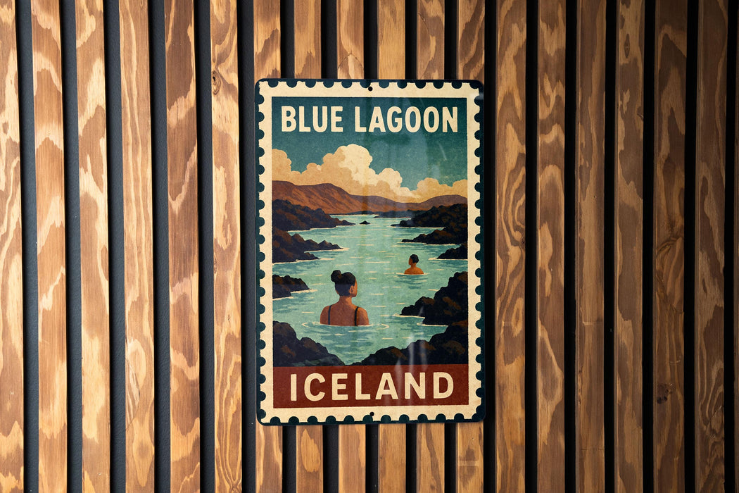 A vintage-style poster of the Blue Lagoon in Iceland, featuring a woman in a bathing suit and a scenic landscape with mountains and water.
