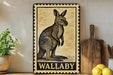 A framed illustration of a kangaroo is displayed on a shelf, accompanied by a wooden cutting board and a potted plant.