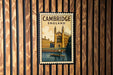 A vintage-style postage stamp depicting a scenic view of Cambridge, England, with a gondola in the foreground and a castle in the background.