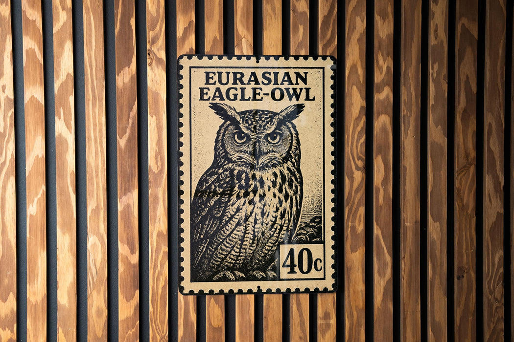 A postage stamp featuring an illustration of an owl, with the text "EURASIAN EAGLE-OWL" printed on it.
